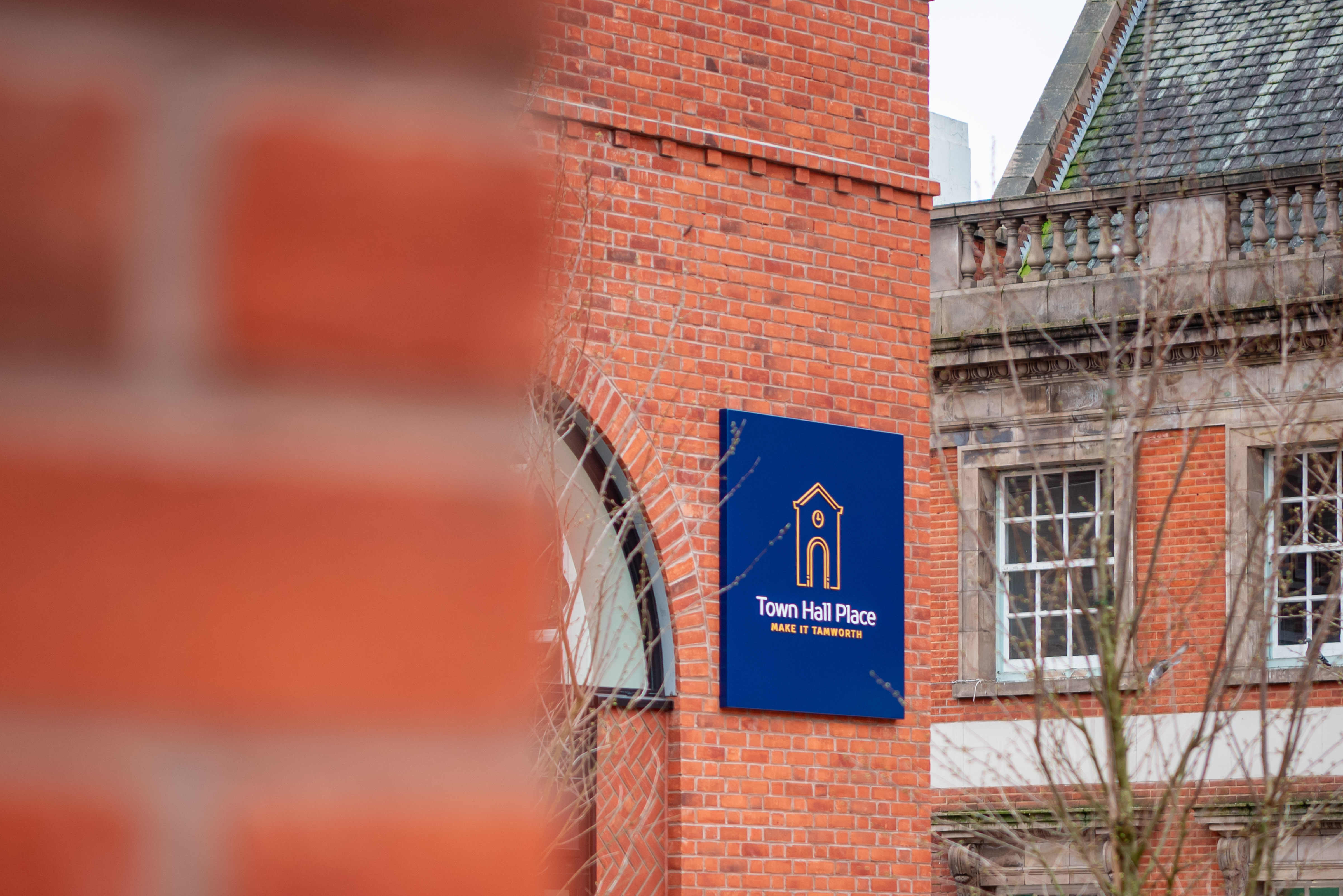 Town Hall Place sign on the building