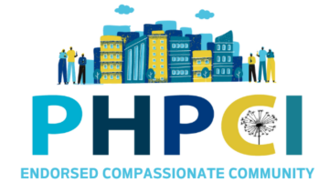 logo for compassionate community statue shows blue and green buildings and text